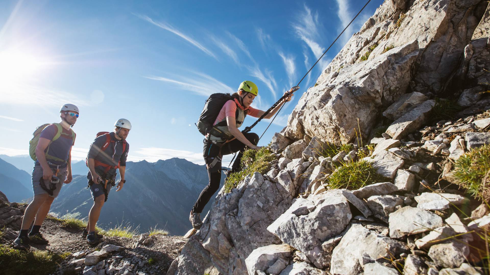 Via ferrata adventure with safety gear and alpine views during summer in Warth am Arlberg.